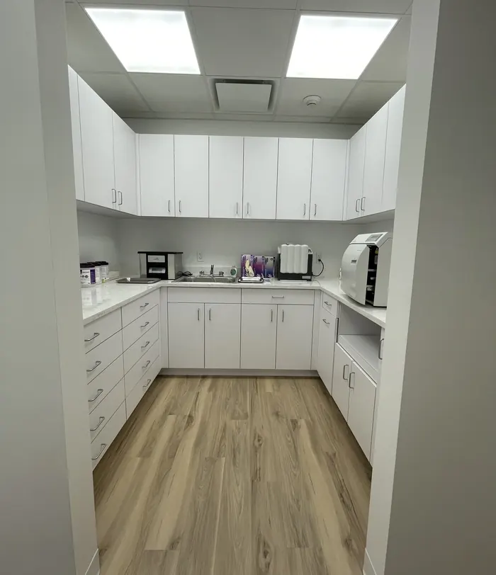 The sterilisation area, with its white cabinetry, at the Seaview Boulevard office.